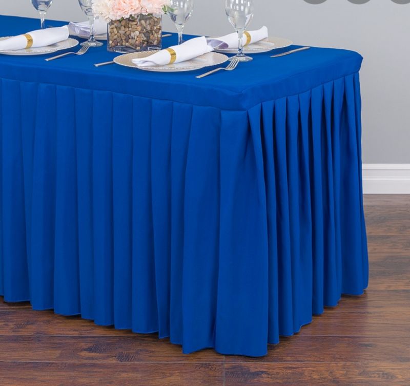 Blue pleated table skirt rental for weddings and events in Long Island