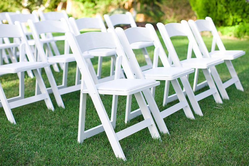 White padded garden chair rental for weddings and outdoor events in holtsville