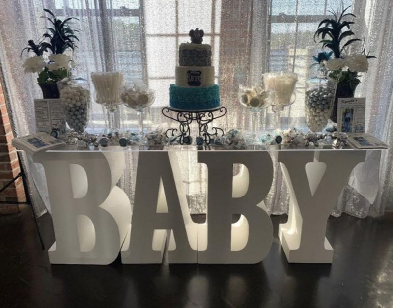 A stylish and versatile "BABY" table rental, perfect for baby showers and gender reveals in Long Island.