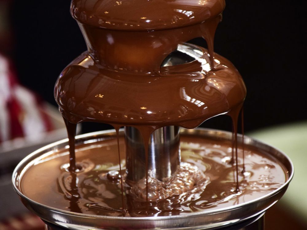 27-inch, 5-tier chocolate fountain rental with 6 lbs of milk or dark chocolate, available for events in suffolk county